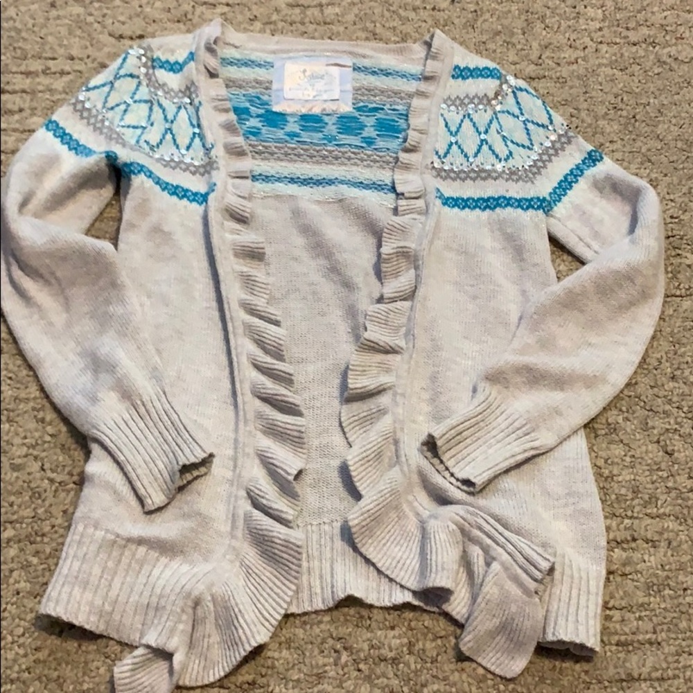 A Justice sweater size youth 12